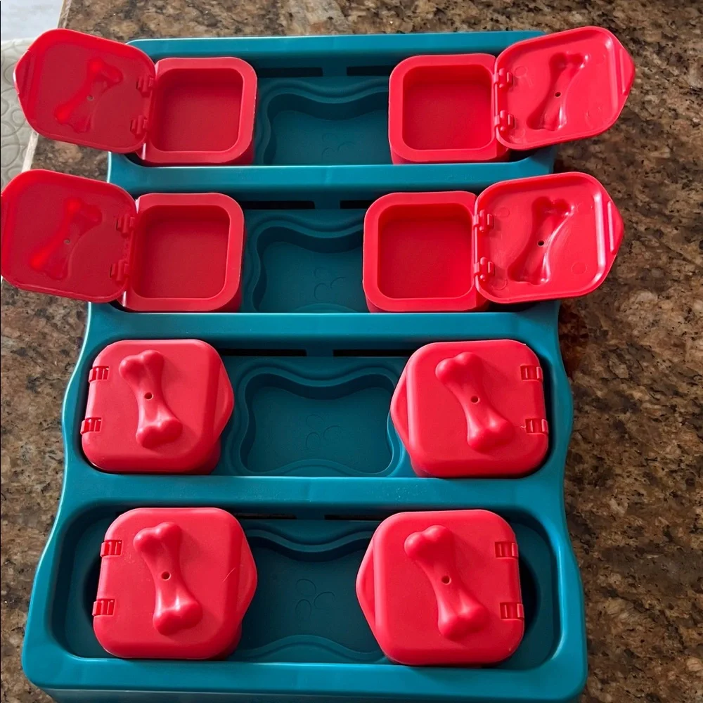 Teal and Red Dog Feeder with Storage Compartments